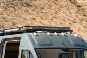 Tommy Camper roof rack with decking panels on the Ram Promaster