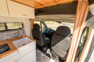 Cab seats seen past the galley and farm sink