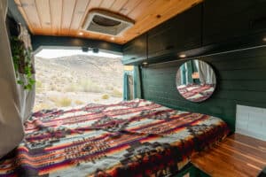 Bed across the rear of the Transit camper van