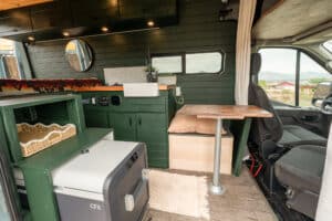 Pull-out Dometic fridge, galley cabinets and table