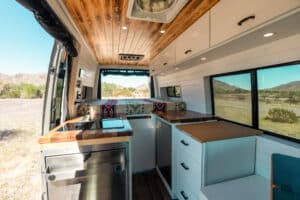 Interior looking forward past the galley and sink to the cab