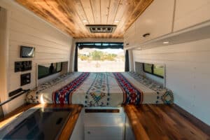 View over the galley to the bed with rear doors open