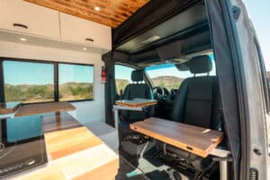 Interior toward the cab with the Lagun table and factory swivel seats